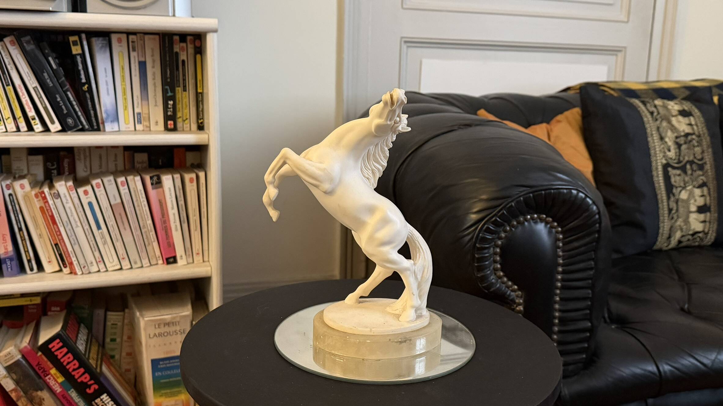 White rearing horse statuette