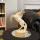 White rearing horse statuette