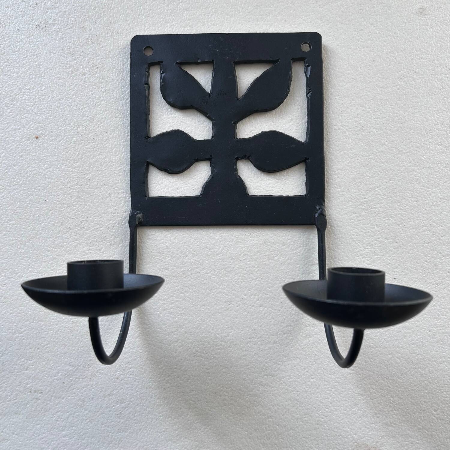 Wrought iron wall candle holder