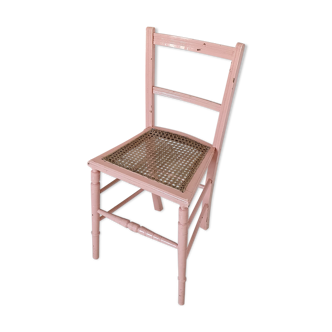 Chaise ancienne vintage rose avec assise cannage