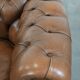 Brown cowhide leather chesterfield armchair  in English style on wheels