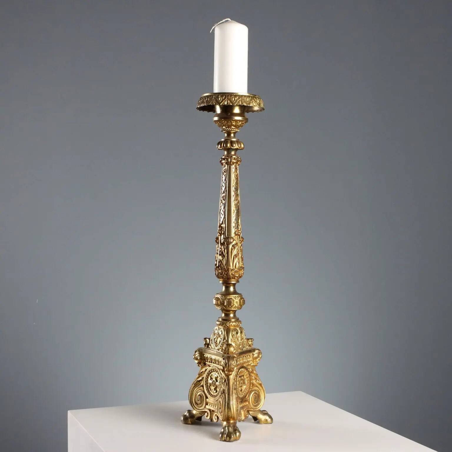 Antique gilded bronze candelabrum, 19th-century decorations.