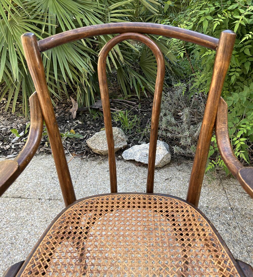 Baumann caned curved wooden armchair, 1900