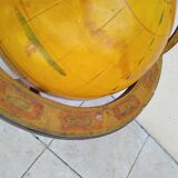 Old terrestrial globe world map on wooden stand