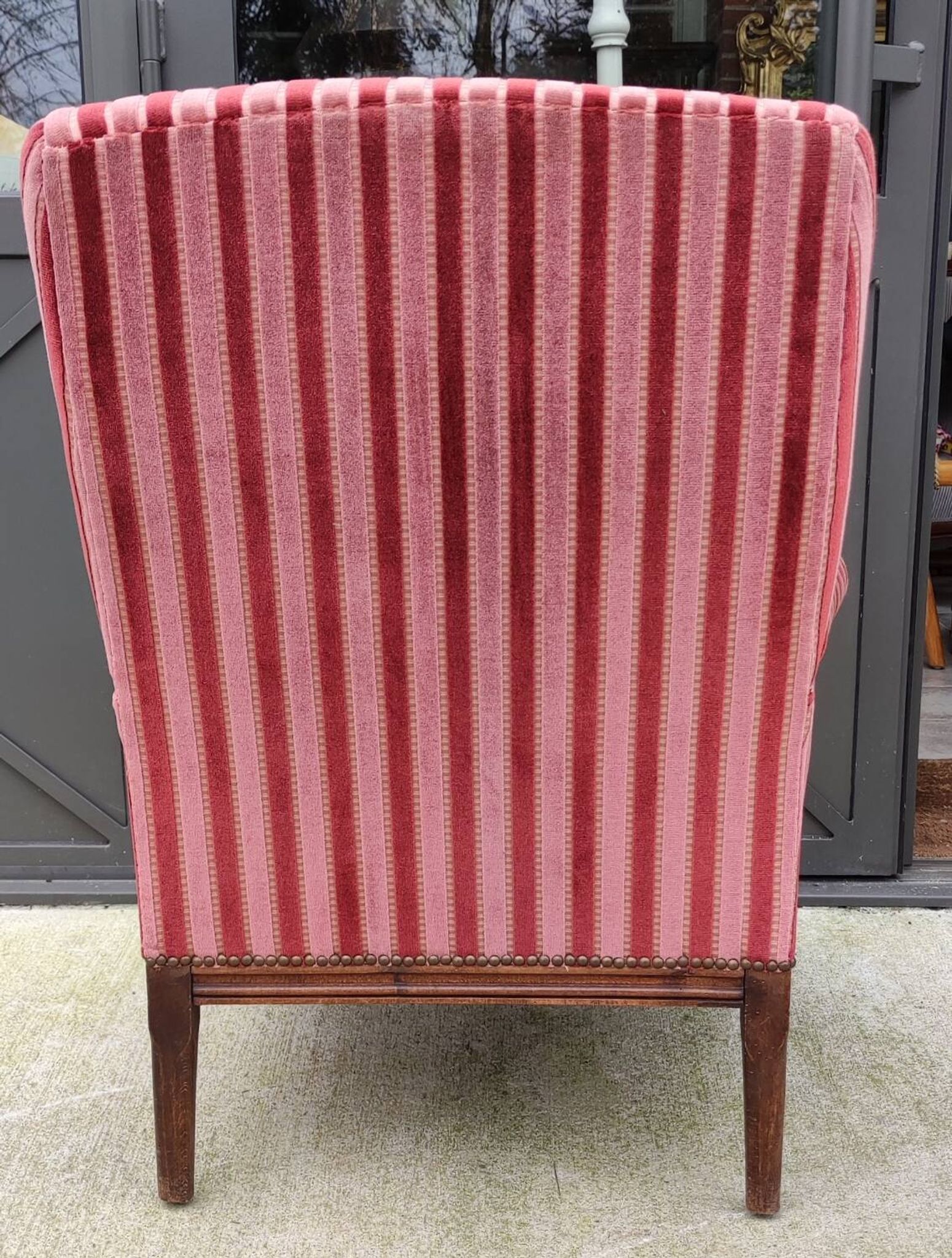 Old armchair and its Louis XVI style footrest/velvet covering