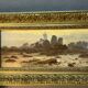 A. Laemmermann, oil painting on cardboard depicting a rocky landscape.