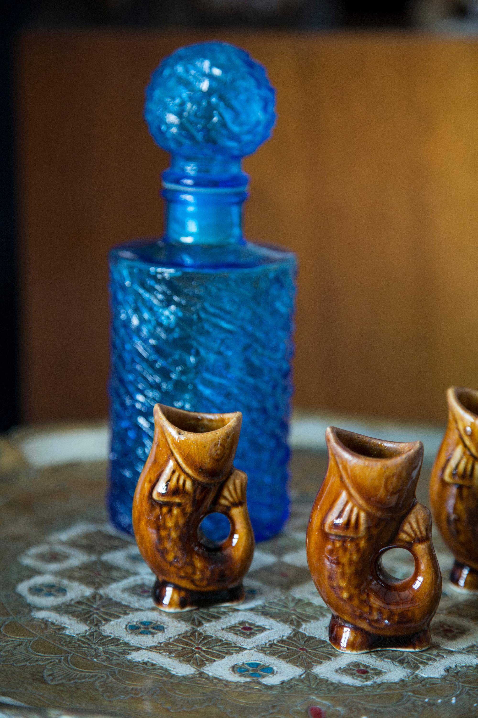 Set of three small brown glass fish, 20th century, Europe, 1960s