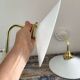 Set of two electrified white opaline wall lamps to nine