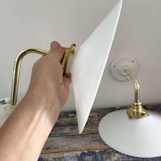 Set of two electrified white opaline wall lamps to nine