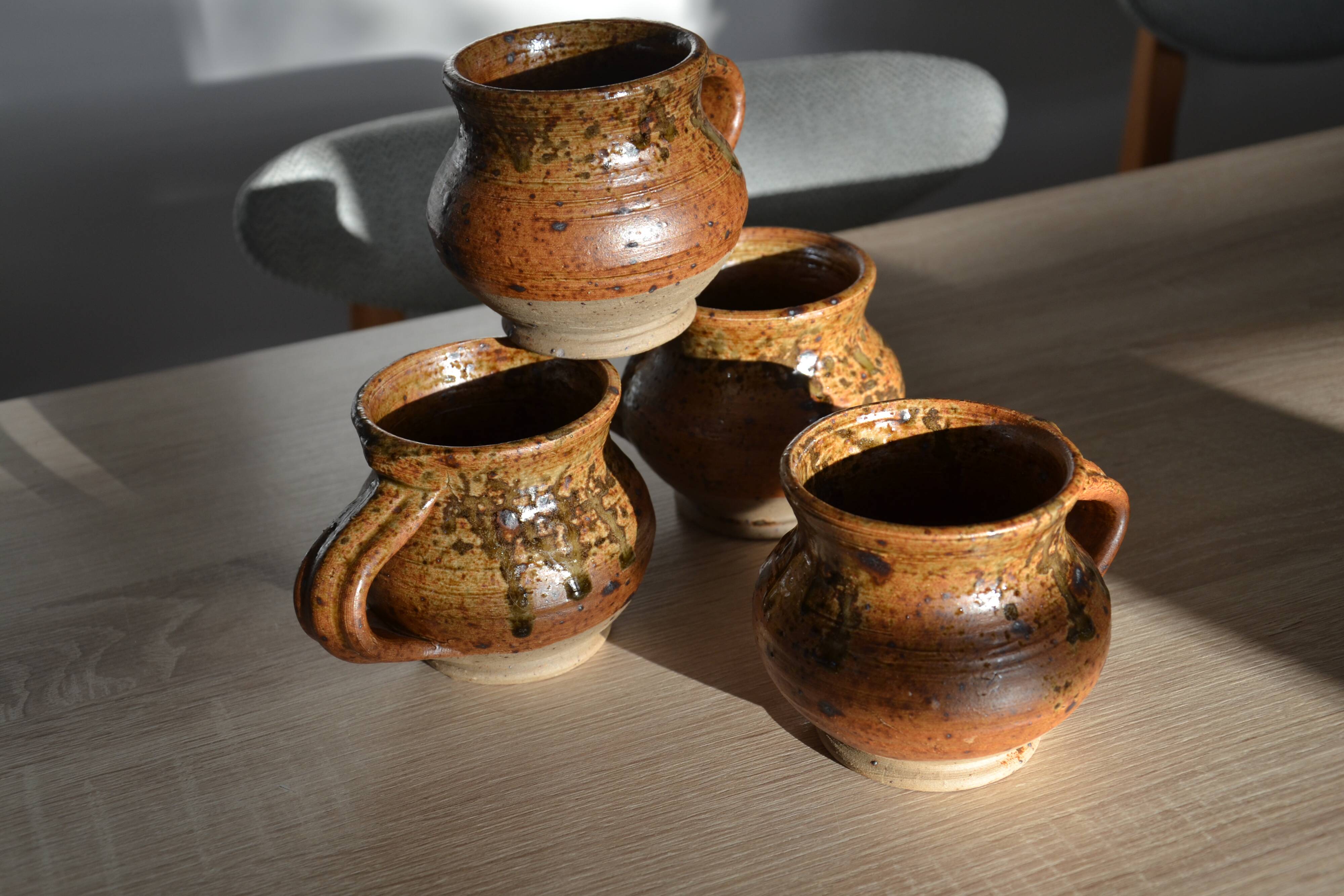 4 pyrite stoneware cups/mugs/coffee cups signed J.P.G.