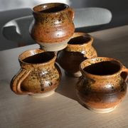4 pyrite stoneware cups/mugs/coffee cups signed J.P.G.