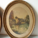 Old pair of lithographs house at the edge of the water signed wooden medallion frame