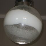 Murano Mazzega globe pendant light with a bold swirl, 1960s