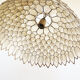 Petal hanging of mother-of-Pearl and brass