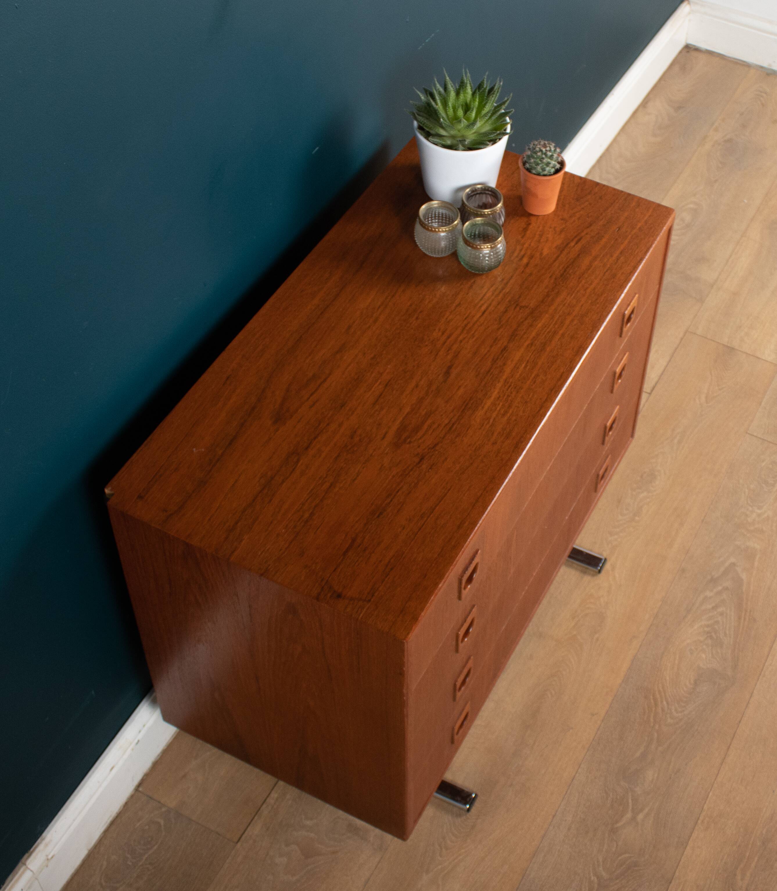 Retro teak 1960s danish chest of drawers on metal legs