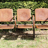 Row of theater folding seats, early twentieth century