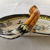 Decorated earthenware dish with handle signed Henriot Quimper