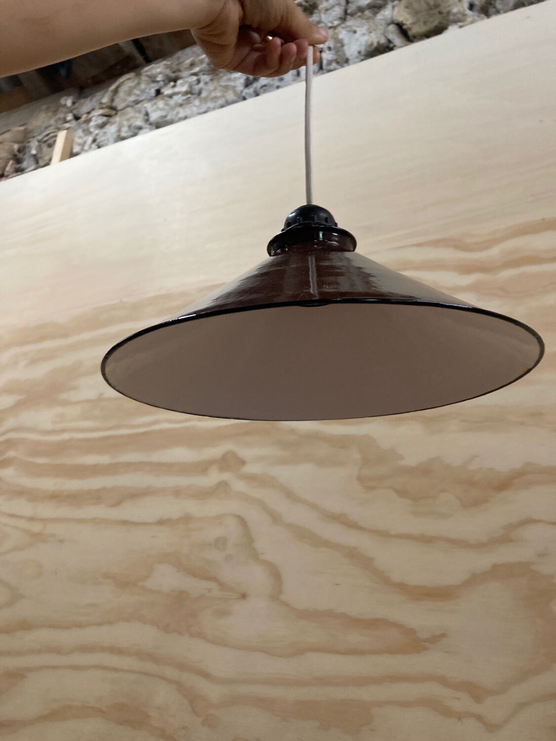 Industrial pendant light in brown and white enameled sheet metal