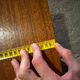 Scandinavian extendable dining table in teak veneer.