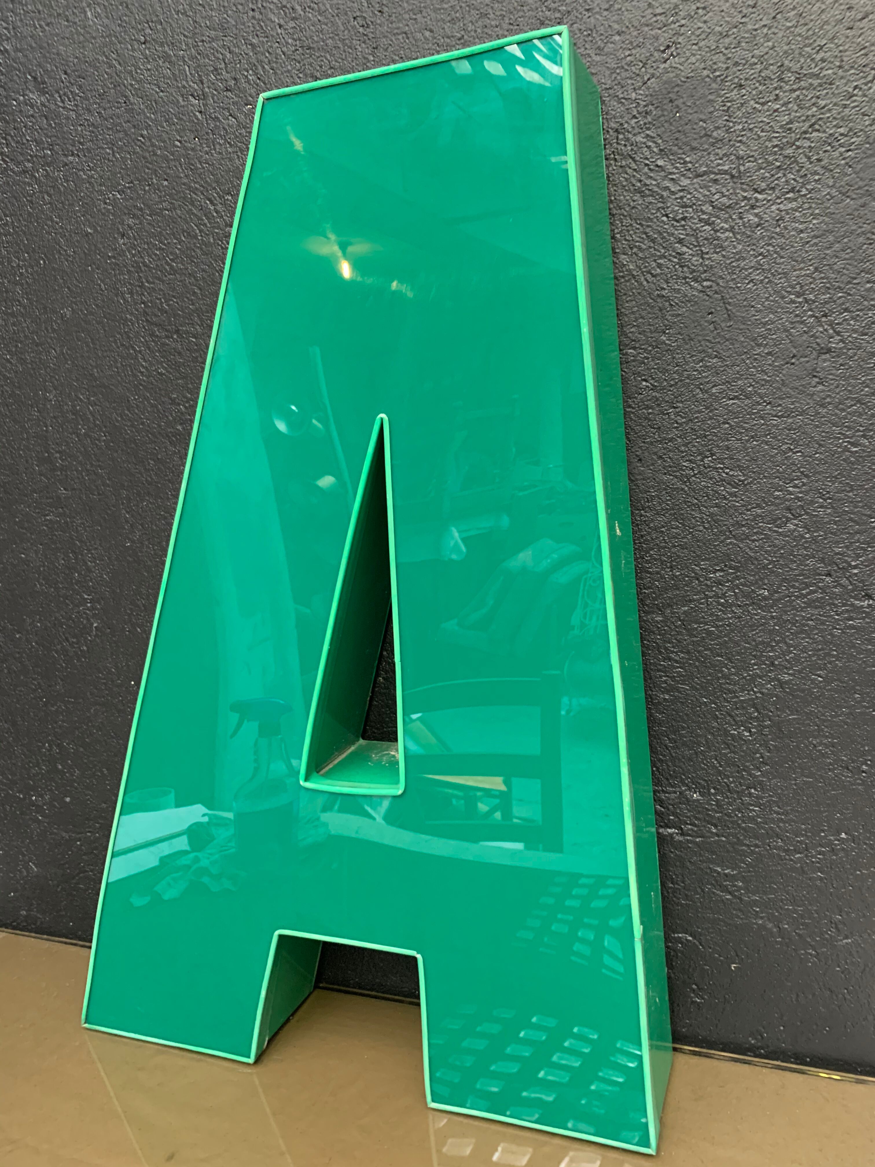 Old letter in metal and plexiglass, industrial decoration