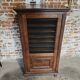 Antique printer's style wooden workshop furniture – mesh door
