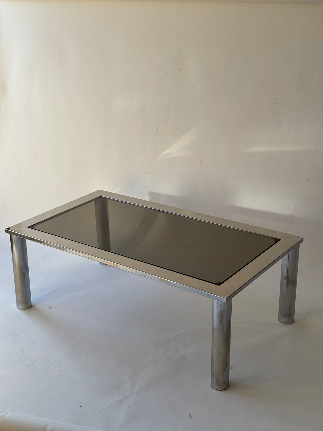 Chrome metal and smoked glass coffee table, 1970.