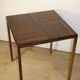 Vintage side table in rosewood & bronze – 1960s