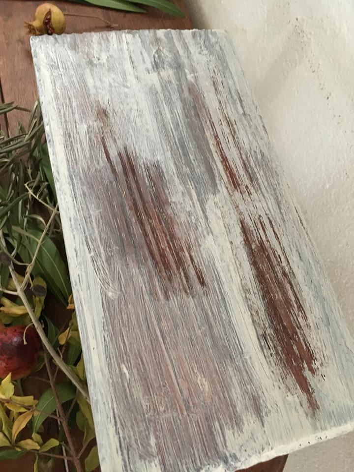 Wooden footrest in his white patina