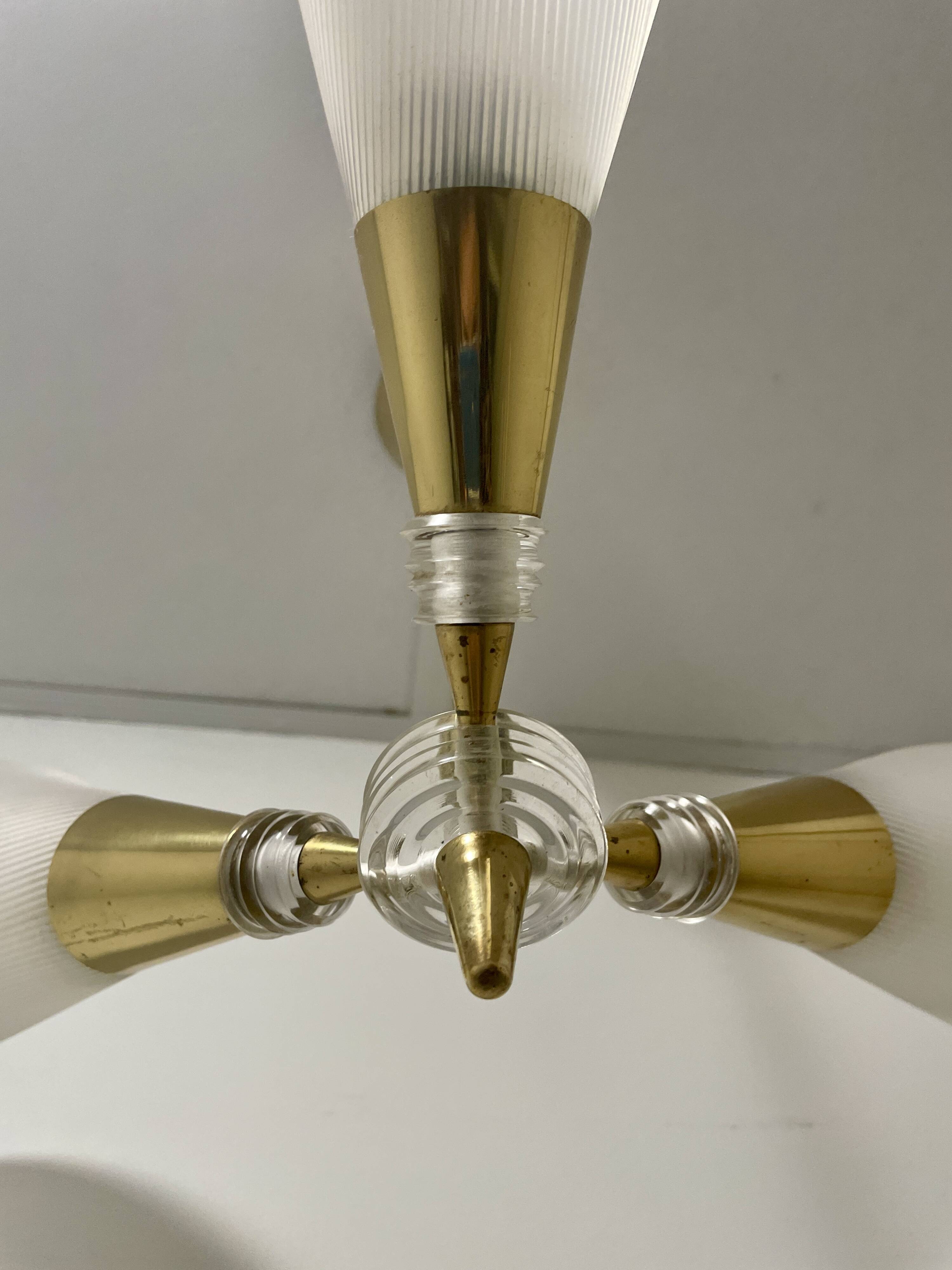 Vintage chandelier with plexiglass and brass cones