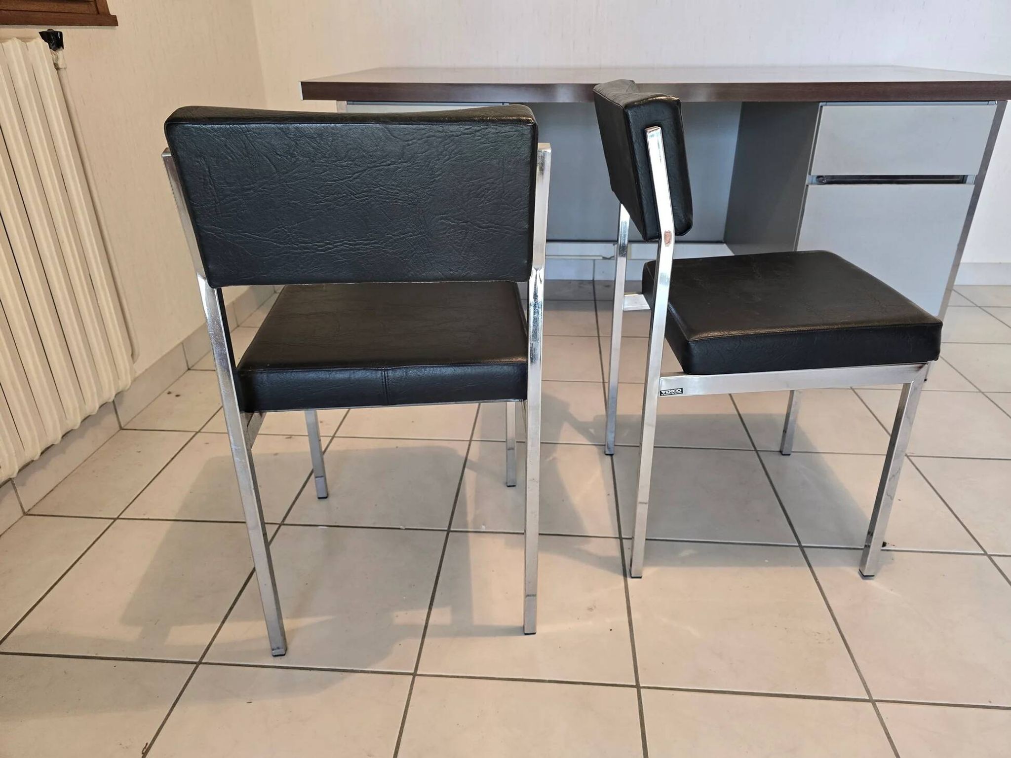 Pair of vintage VINCO chairs in chrome metal and black faux leather.