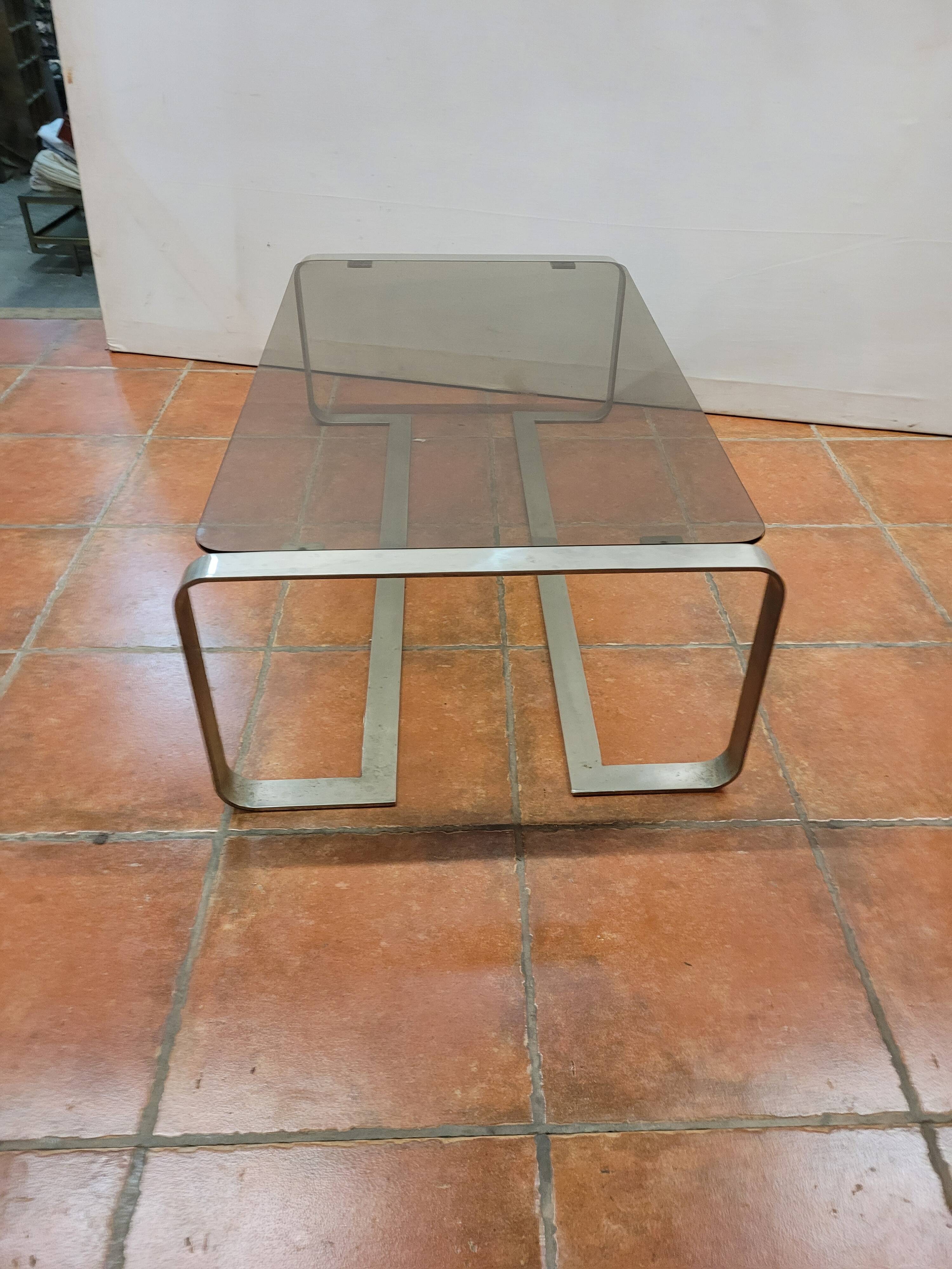Coffee table with stainless steel base and smoked glass, from the 70s
