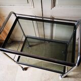 Serving in chrome and smoked glass