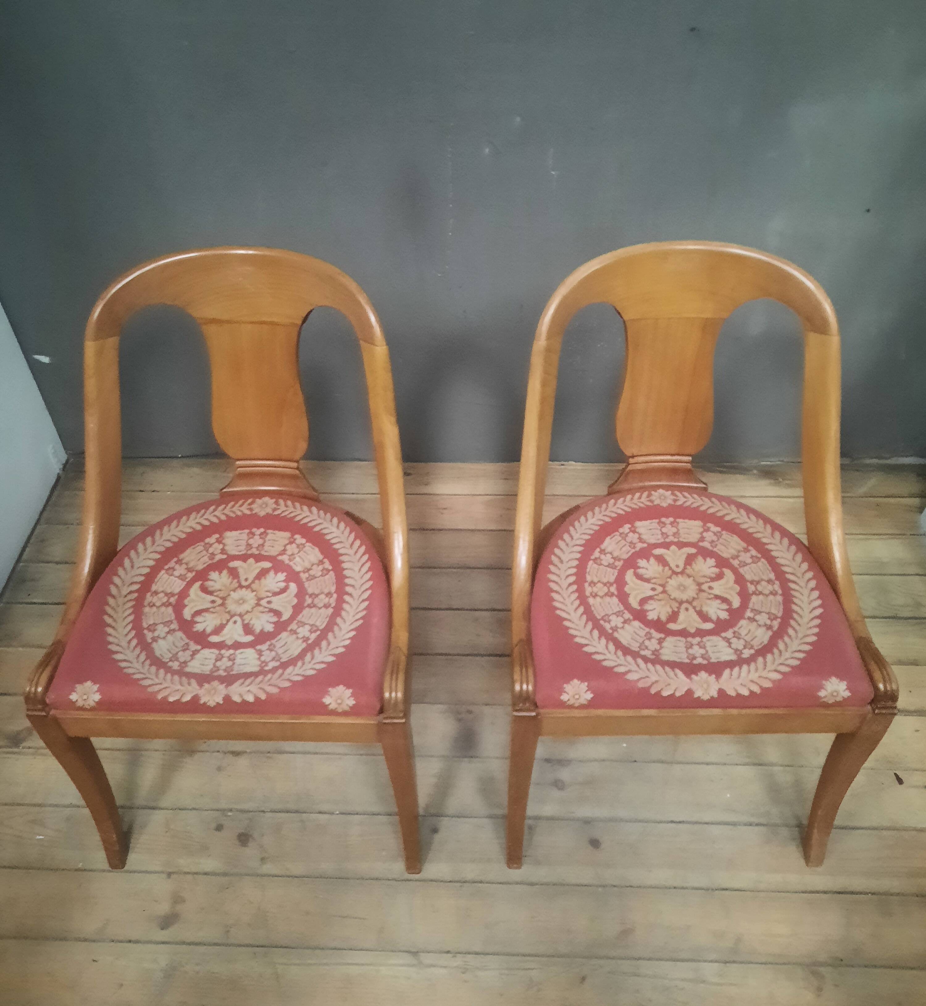 Pair of light wood gondola chairs