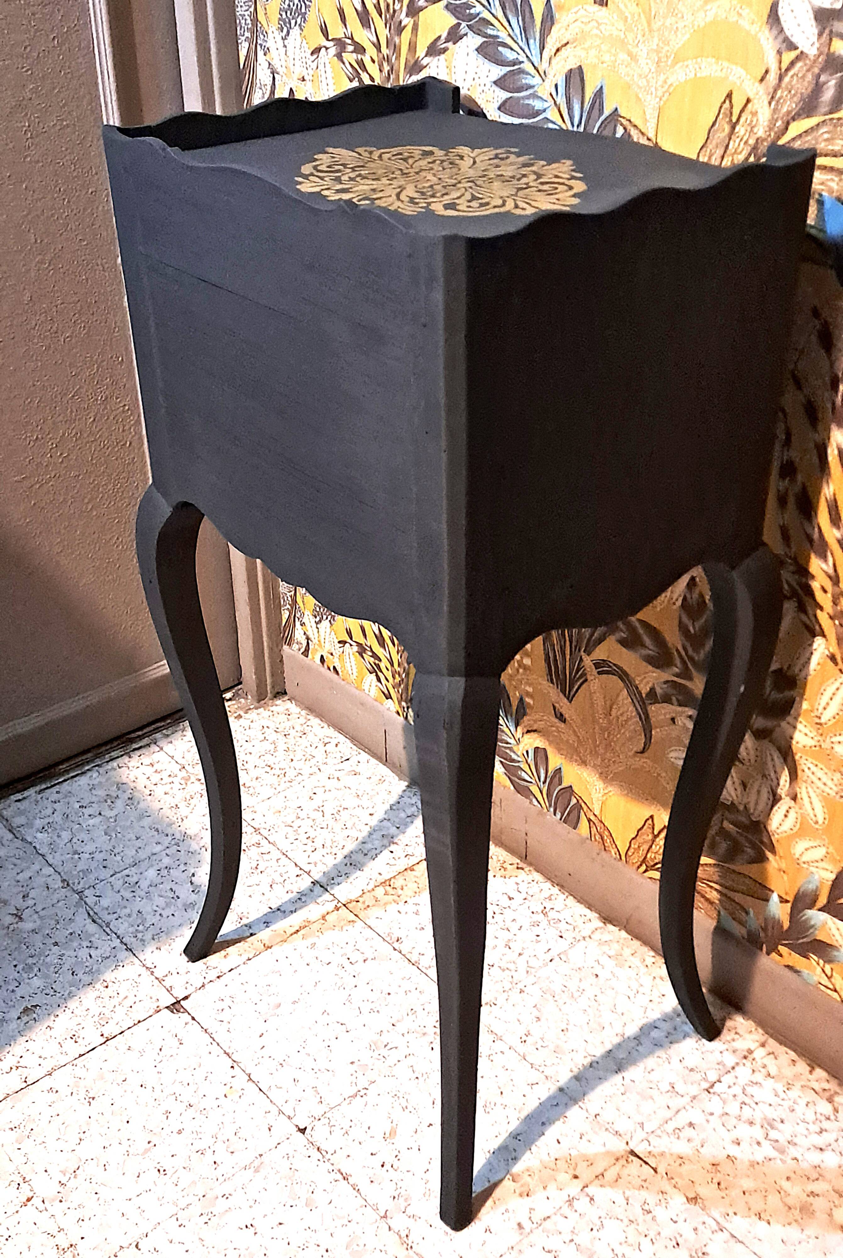 1930 bedside table, repainted wood in black with a golden rose motif.