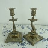 Pair of brass dolphin candlesticks, late 19th century, Napoleonic period