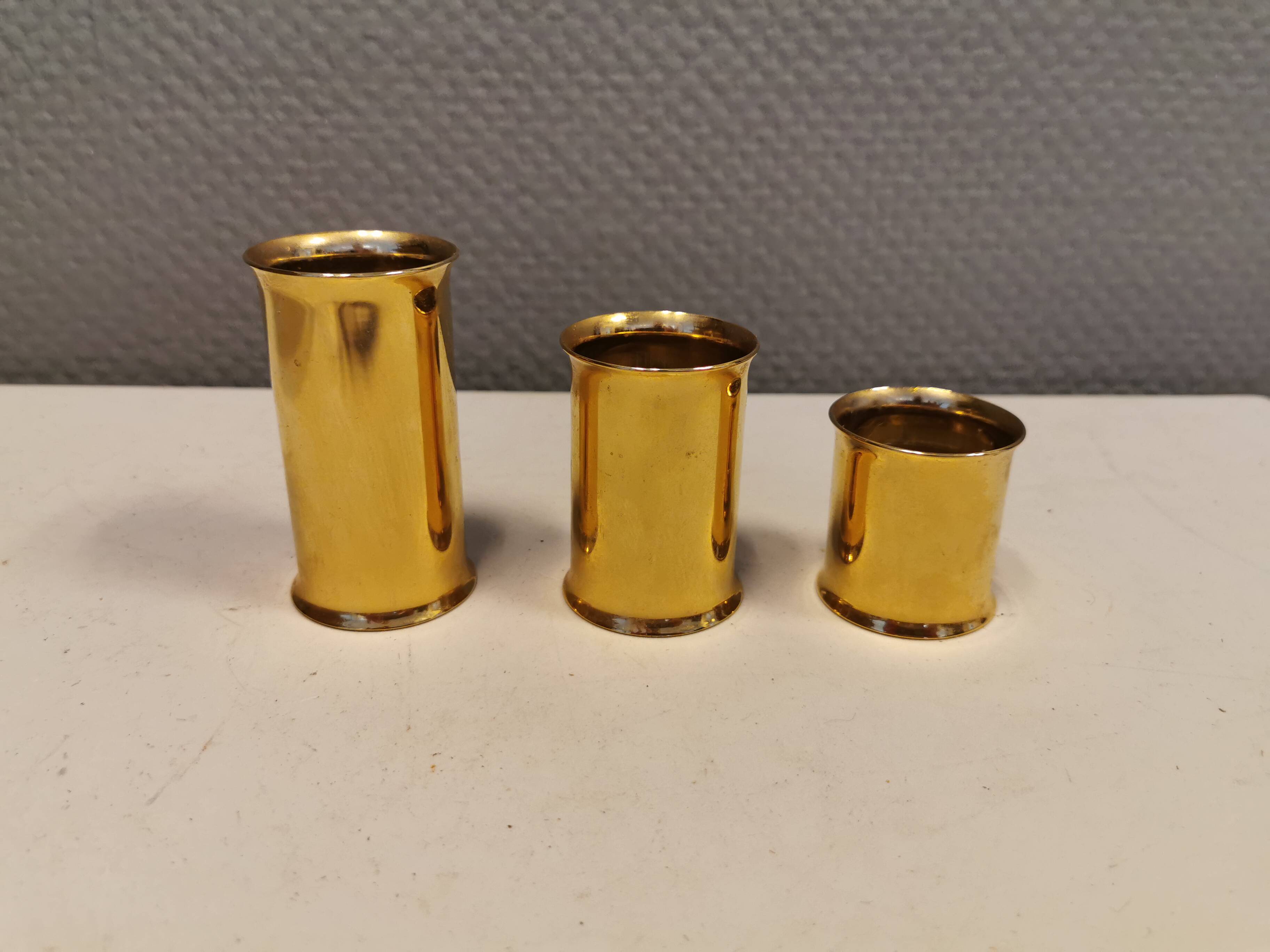3 beautiful candle holders in 24 carat gold plating.  From Danish Altecco.