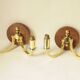 Pair of vintage wall sconces in polished gold brass, wood and glass