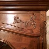 Regency bookcase in solid cherry wood stained walnut.