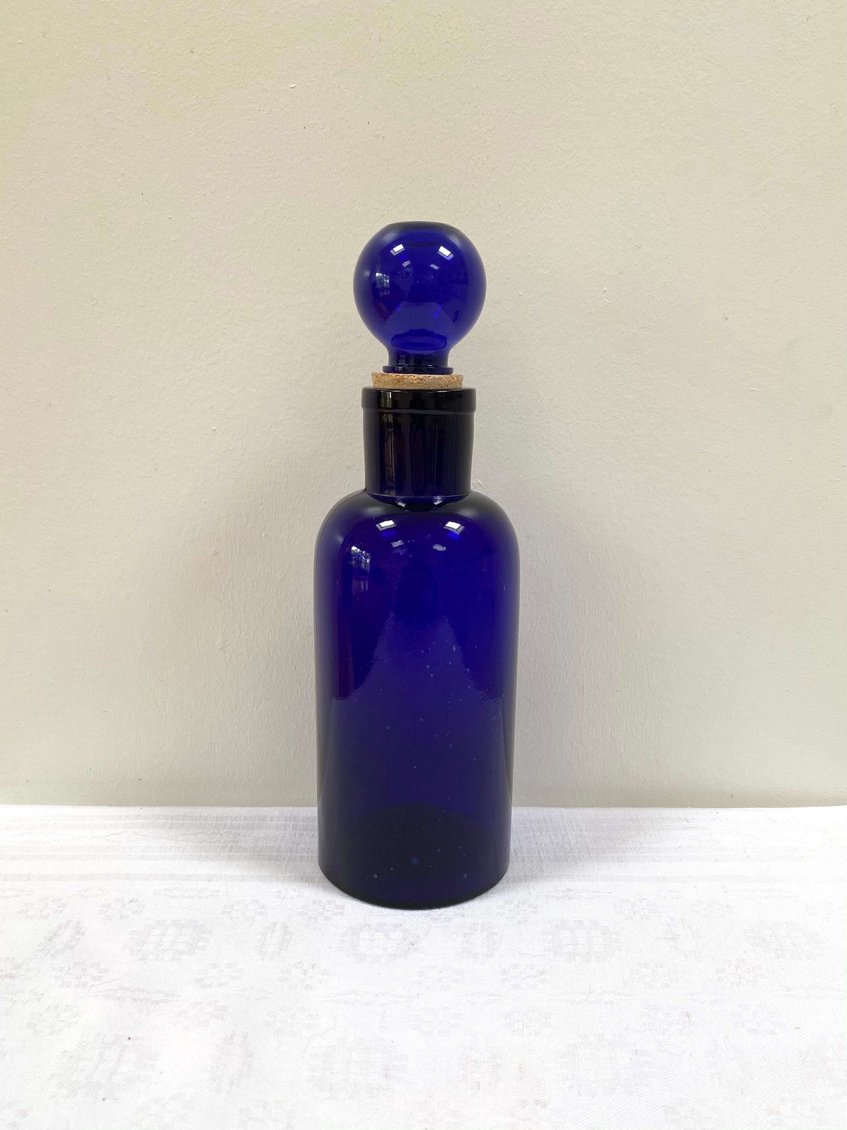 Old apothecary bottle in cobalt blue glass