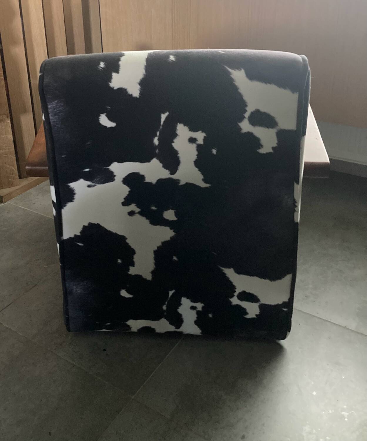 Armchair in walnut and animal print velvet