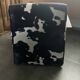 Armchair in walnut and animal print velvet