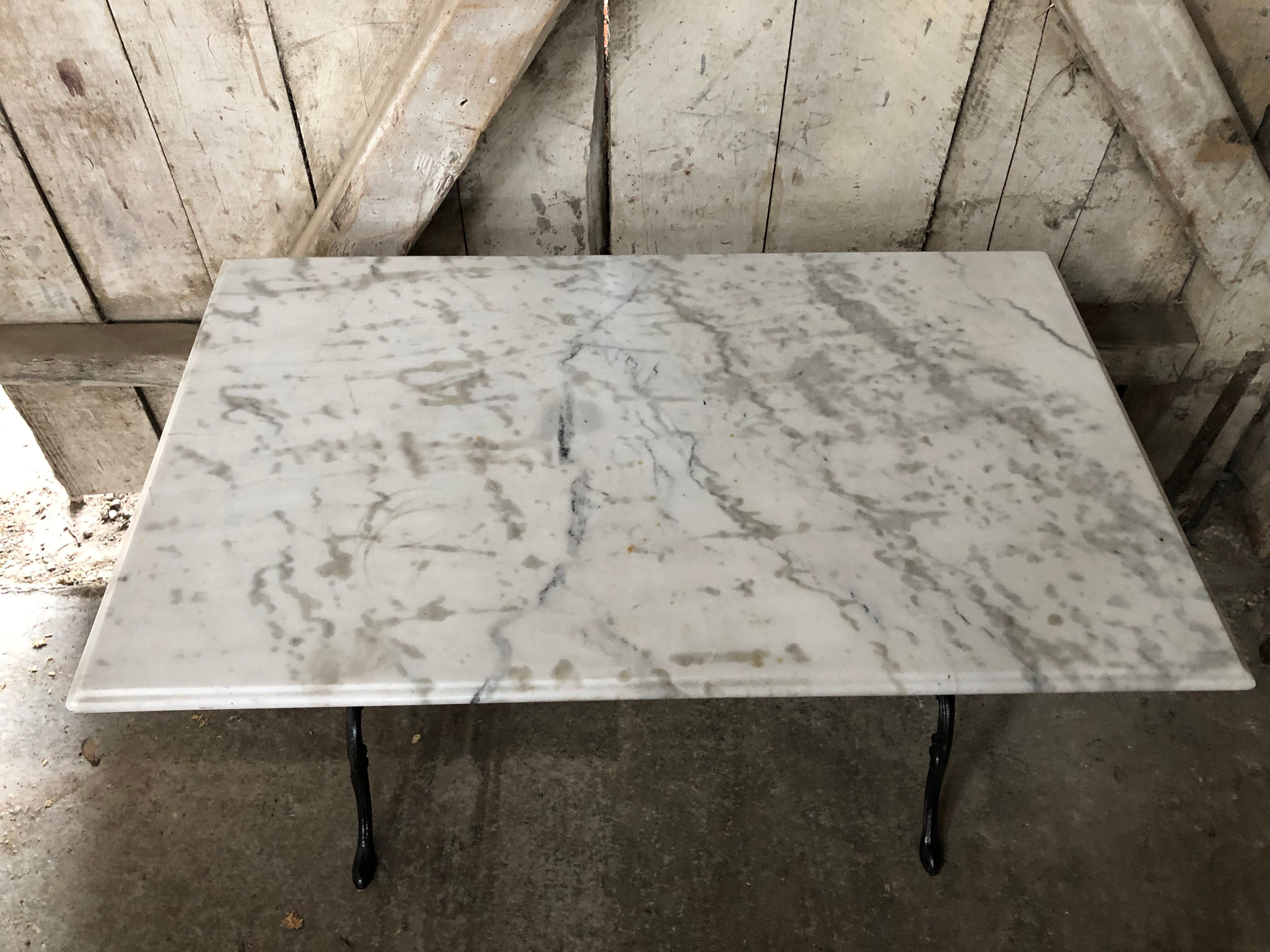 Old bistro table pied fer wrought black + white marble top vintage