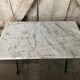 Old bistro table pied fer wrought black + white marble top vintage