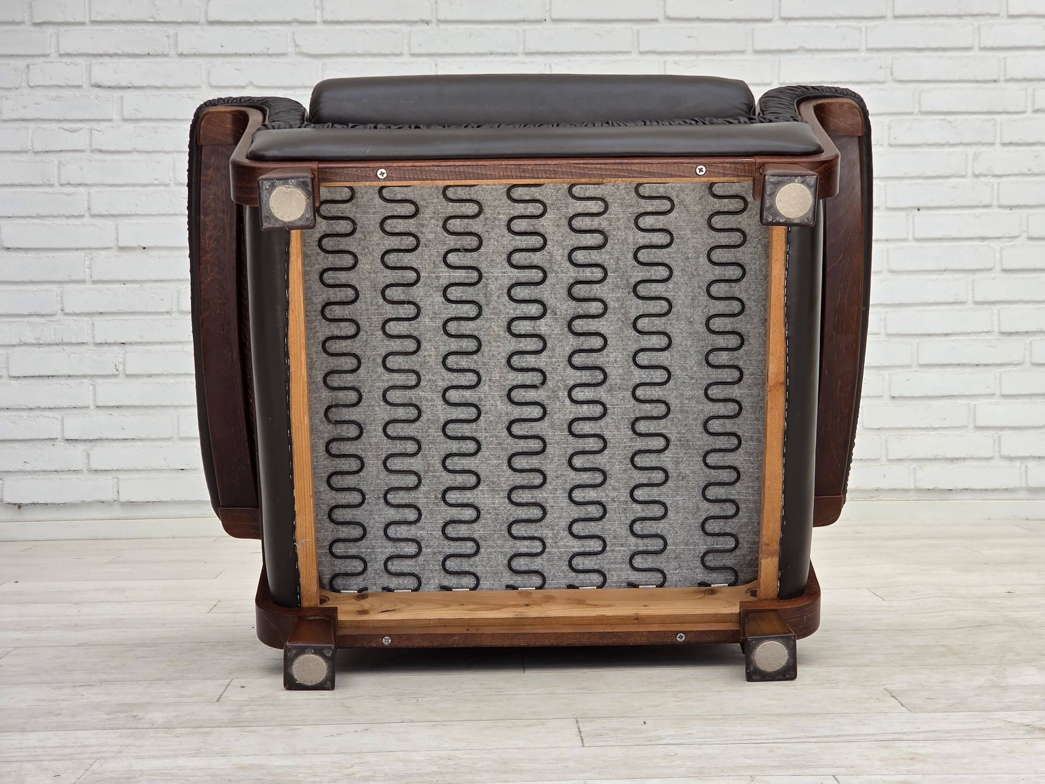 1970s, Scandinavian armchair, brown furniture leather, teak wood legs.