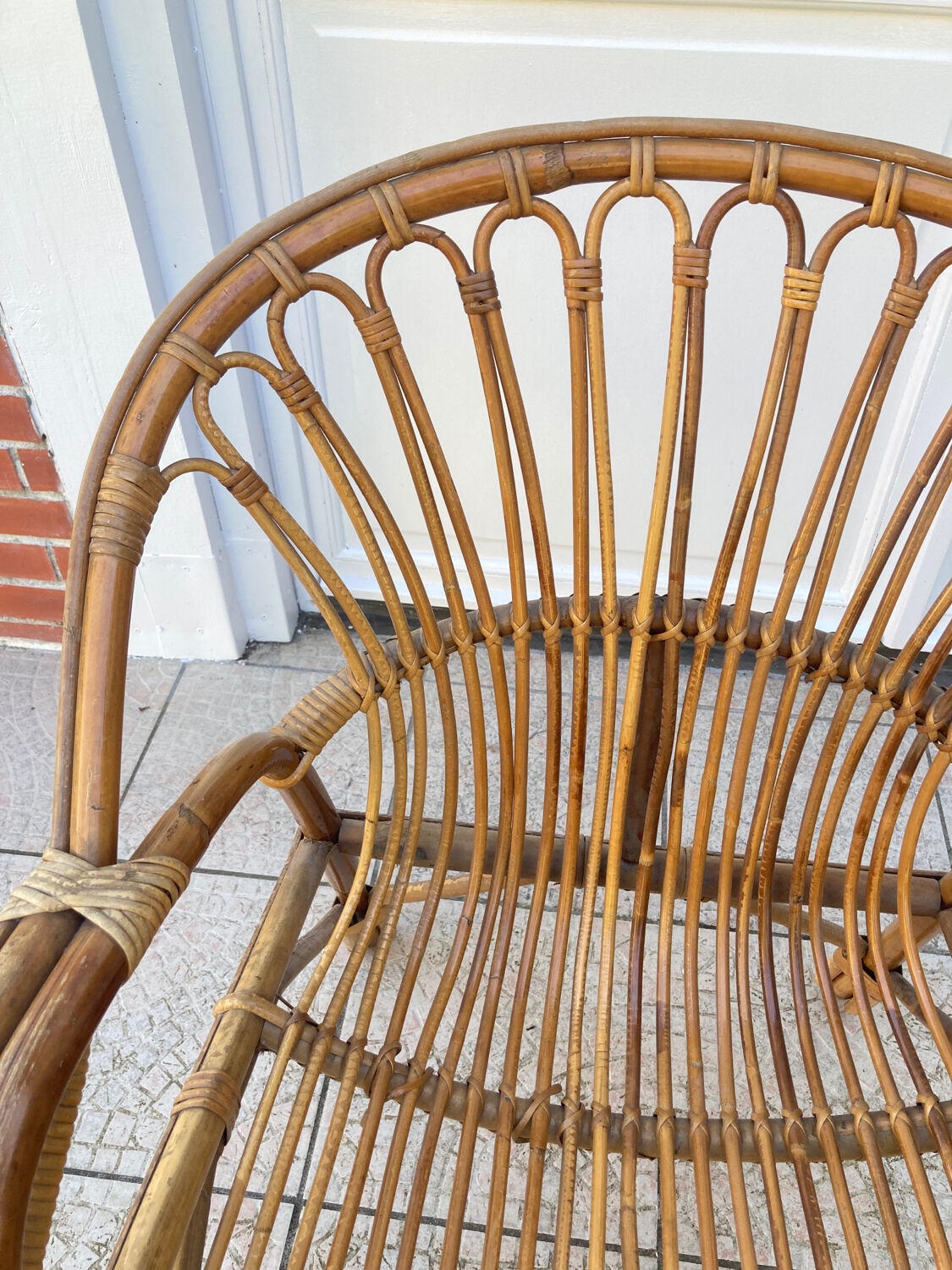 Vintage shell rattan armchair