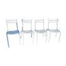 4 white metal chairs