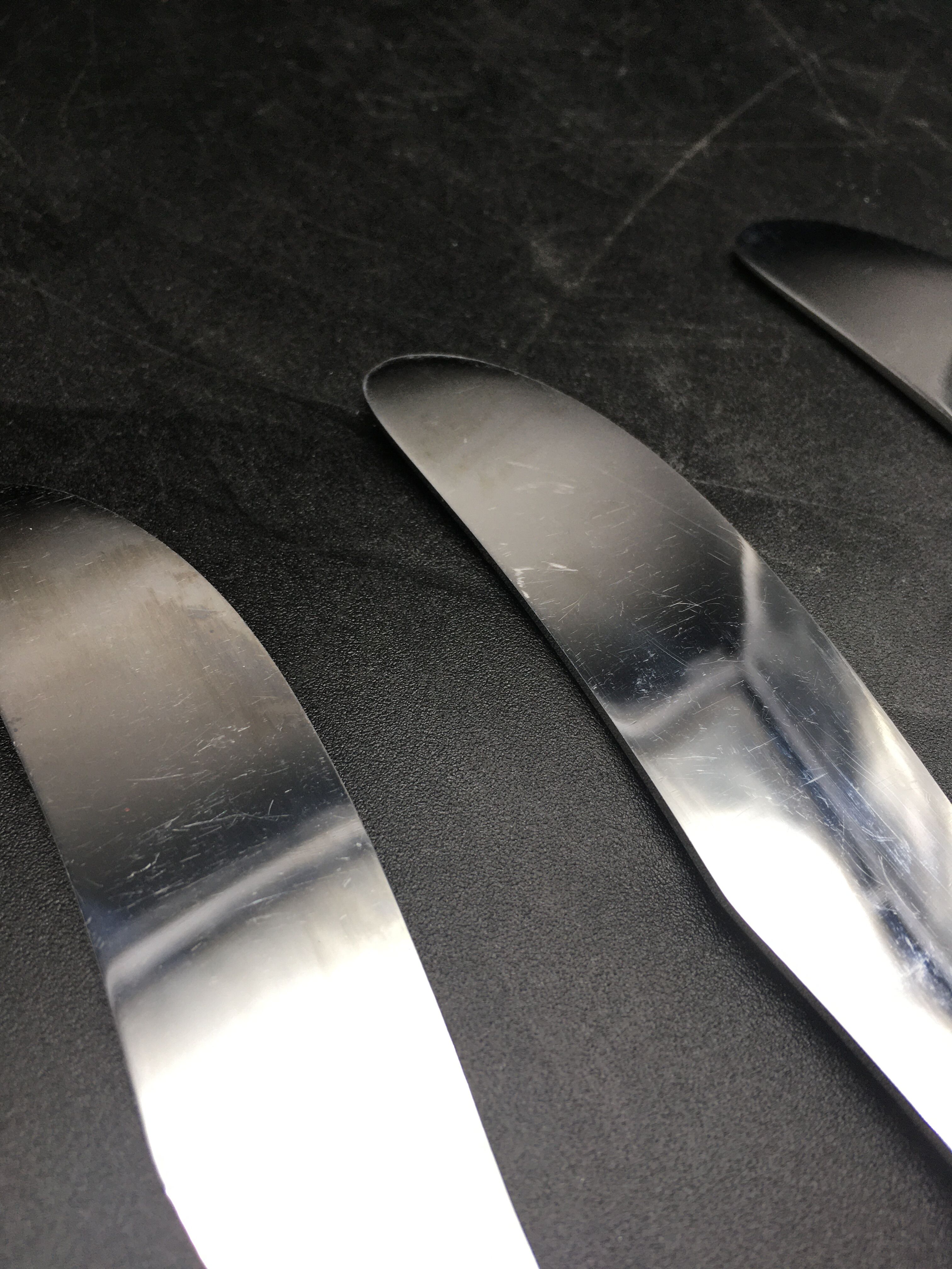 12 silver metal knives