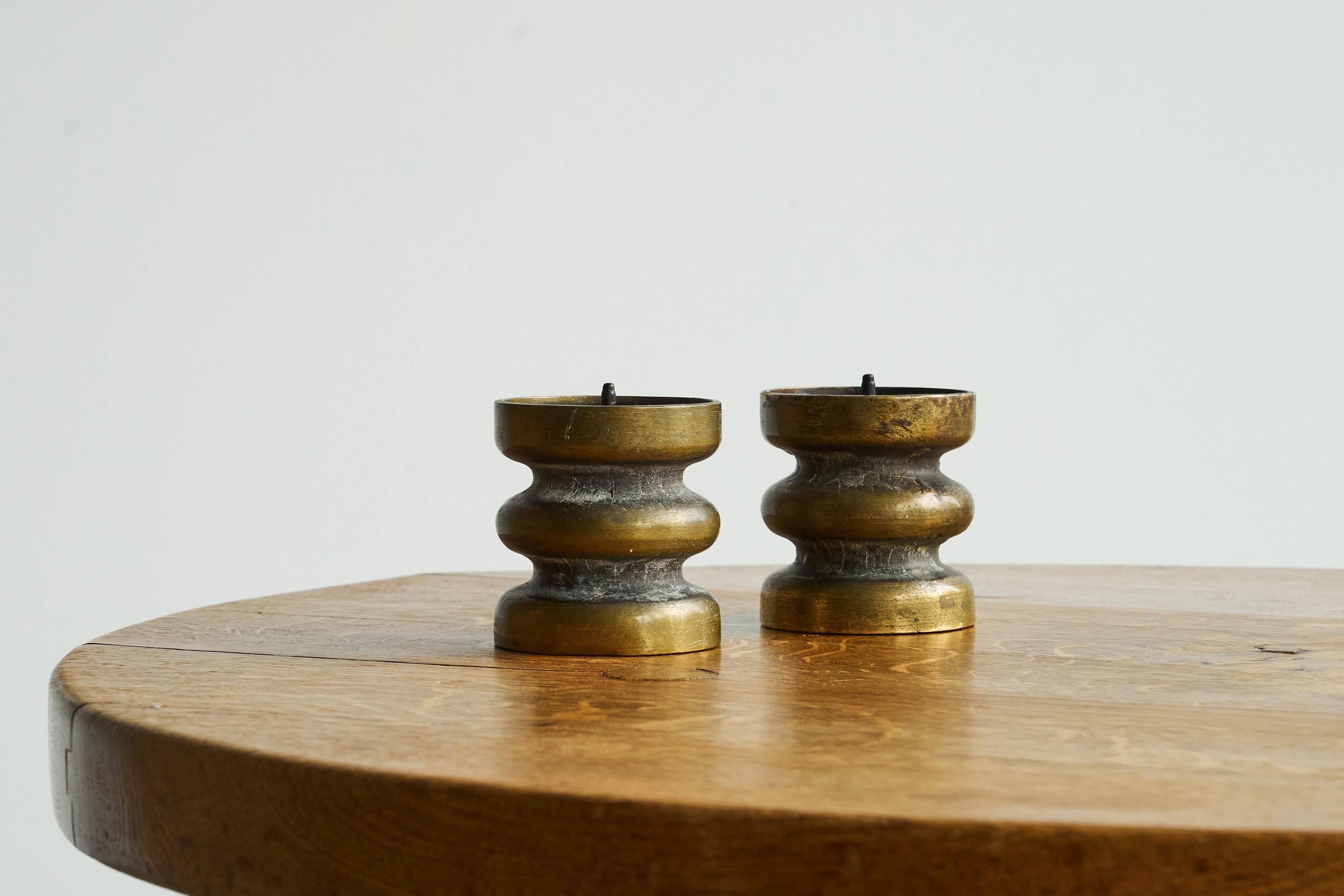 Brutalist pair of patinated bronze candle holders, 1960s