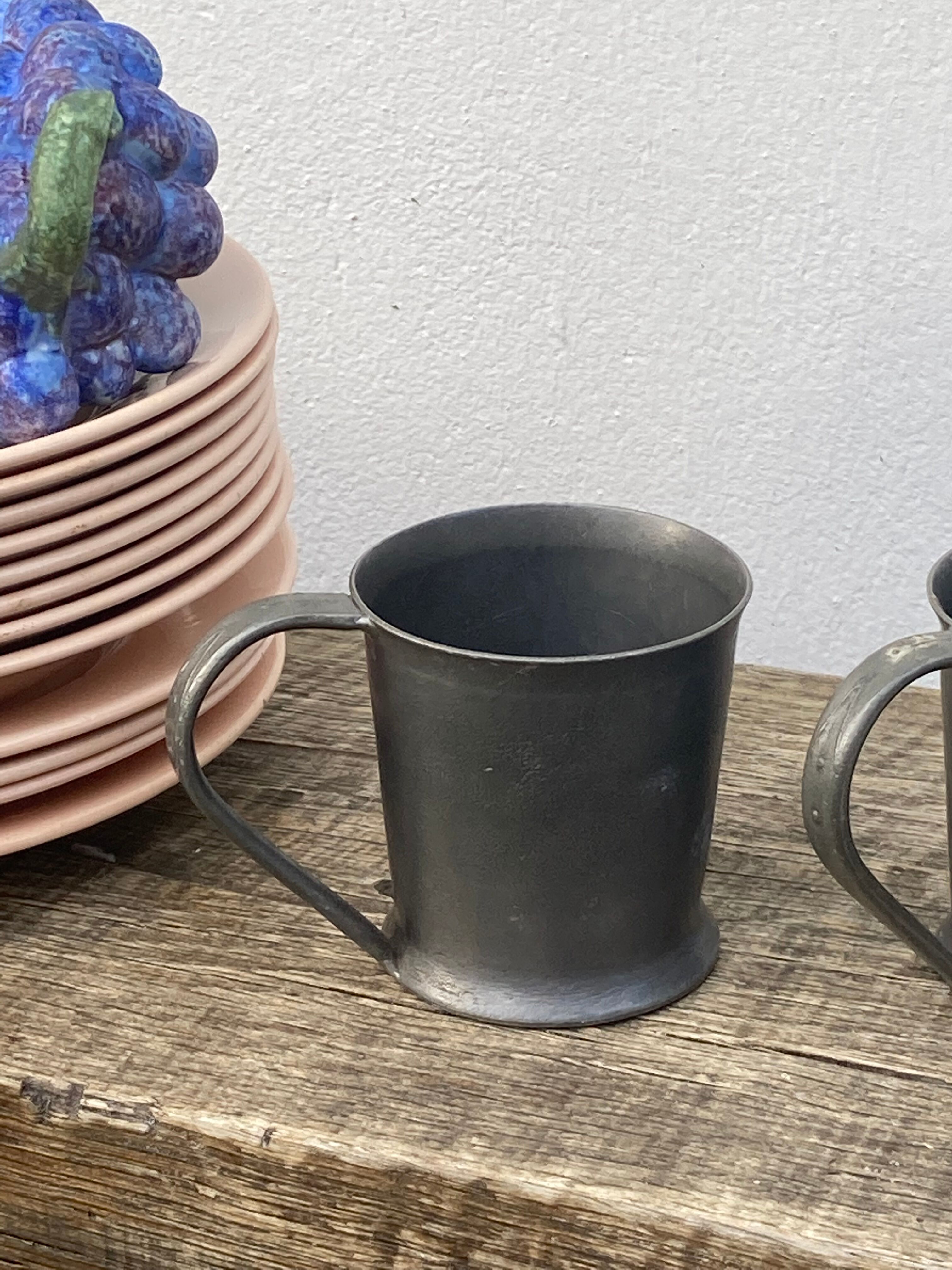 Pair of brutalist pewter cups signed