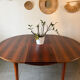Extendable round table in Rio rosewood.